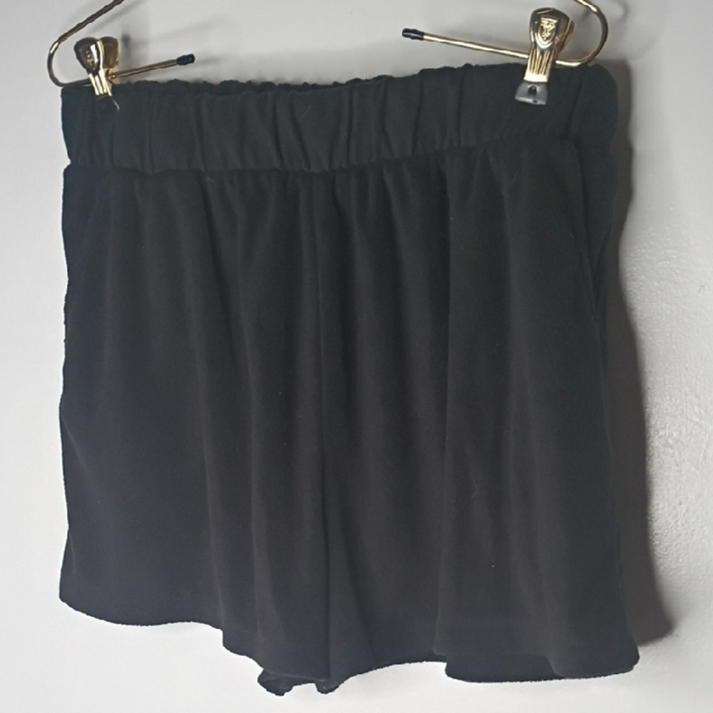 Mixed Stack of Folded Pants and Jeans - White, Purple, Light Blue, Black - Picture 9 of 14